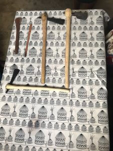 tools laid on a sheet of woven cloth